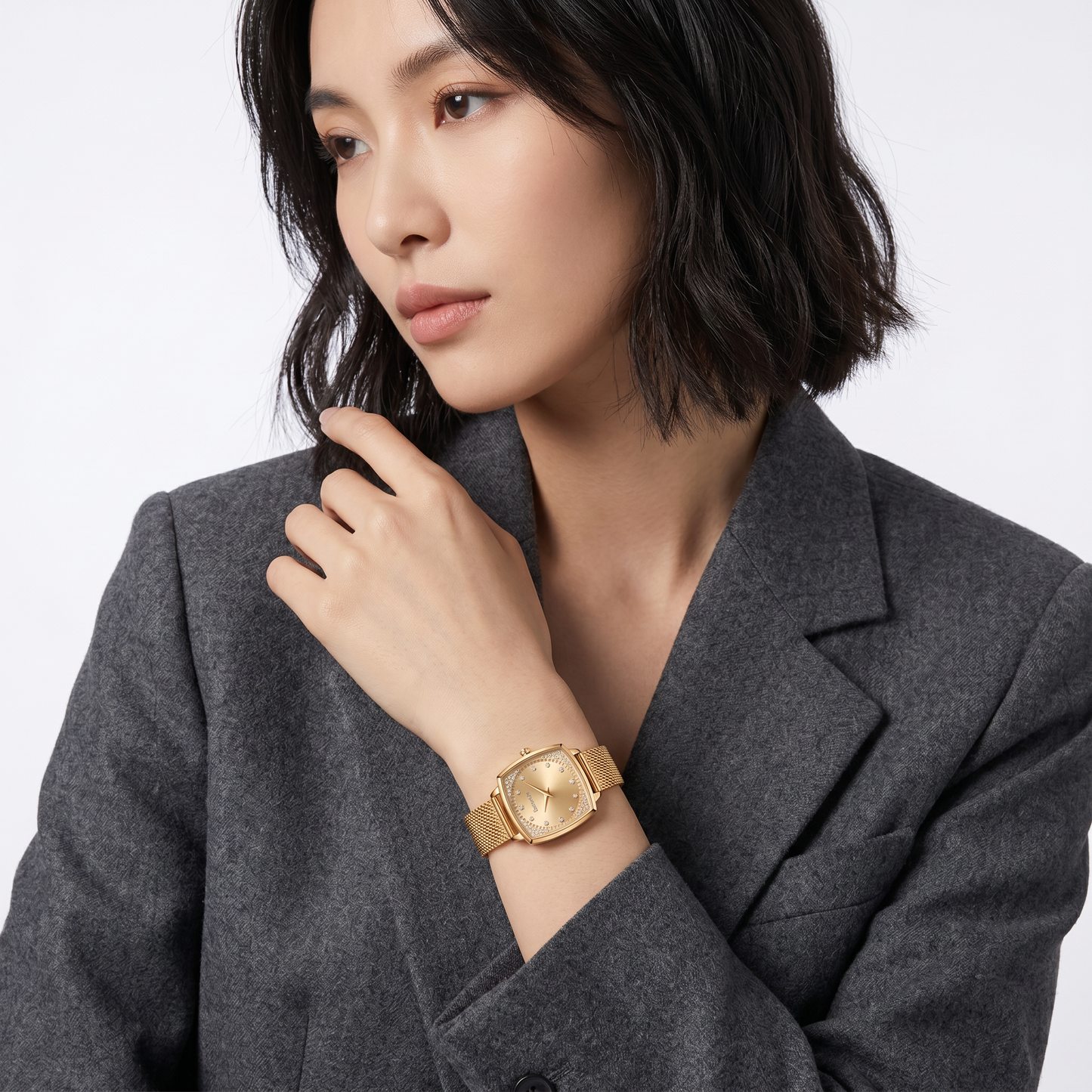 Betterichi-women-cushion-square-watch-lifestyle-shot-gold-crystal-wristwatch